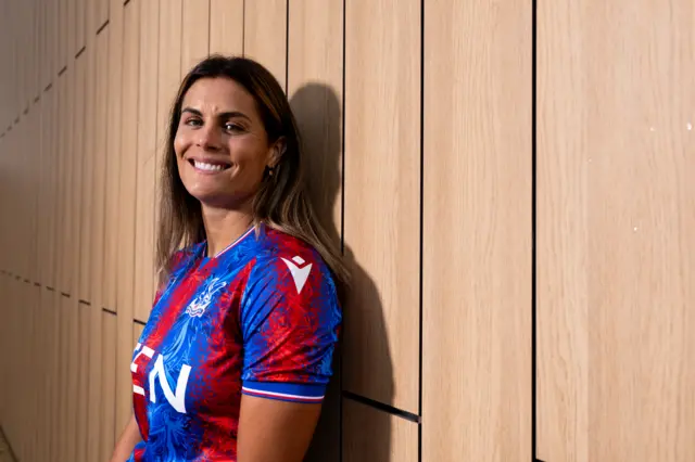 Katie Stengel in a Crystal Palace shirt