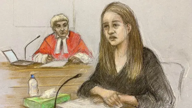 A court sketch of Lucy Letby. The jugde looks on behind her.