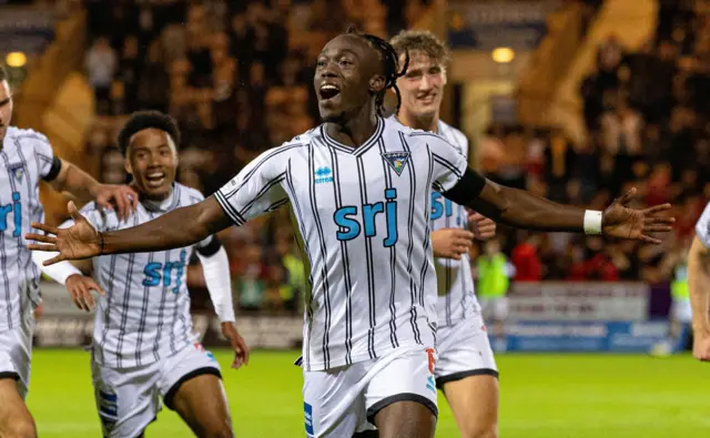 DUNFERMLINE, SCOTLAND - SEPTEMBER 13: Dunfermline's Ewan Otoo celebrates after a Paul Hanlon own goal makes it 1-0 during a William Hill Championship match between Dunfermline and Raith Rovers at KDM Group East End Park, on September 13, 2024, in Dunfermline, Scotland. (Photo by Mark Scates / SNS Group)