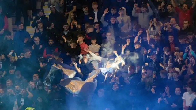 DUNFERMLINE, SCOTLAND - SEPTEMBER 13: Pyrotechnic in the Raith end during a William Hill Championship match between Dunfermline and Raith Rovers at KDM Group East End Park, on September 13, 2024, in Dunfermline, Scotland. (Photo by Mark Scates / SNS Group)