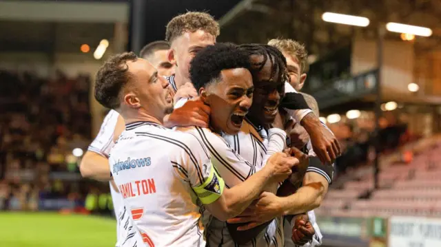 DUNFERMLINE, SCOTLAND - SEPTEMBER 13: Dunfermline's Ewan Otoo (R) celebrates with Kane Ritchie-Hosler after a Paul Hanlon own goal makes it 1-0 during a William Hill Championship match between Dunfermline and Raith Rovers at KDM Group East End Park, on September 13, 2024, in Dunfermline, Scotland. (Photo by Mark Scates / SNS Group)