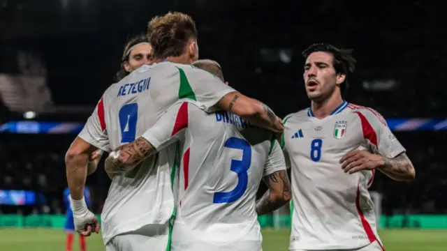 Sandro Tonali celebrates with his Italy team-mates