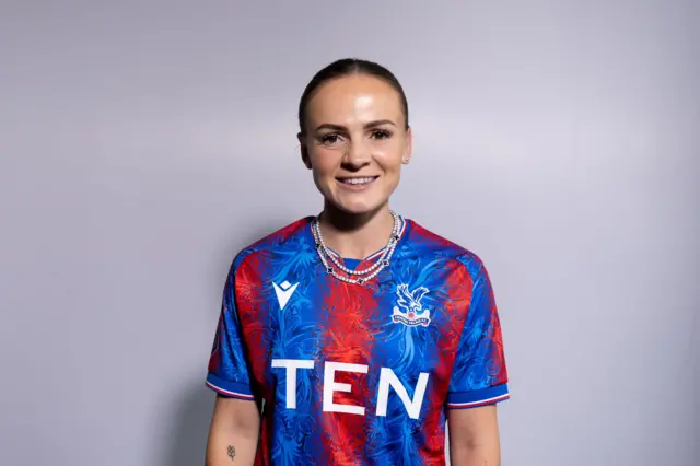 Lily Woodham in a Crystal Palace shirt