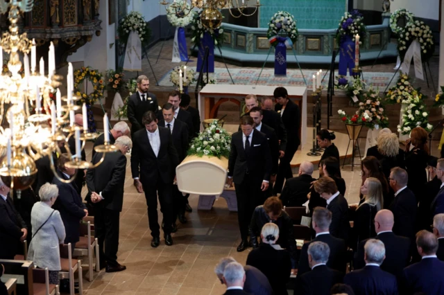 Pallbearers carry the coffin of Sven-Goran Eriksson out of the Fryksande church