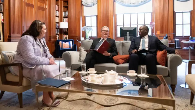 Starmer and Lammy sitting on one sofa and the British ambassador to the US, Karen Pierce, sitting on another sofa