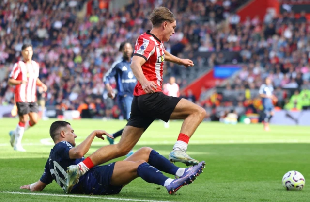 Diogo Dalot fouls Southampton's Tyler Dibling