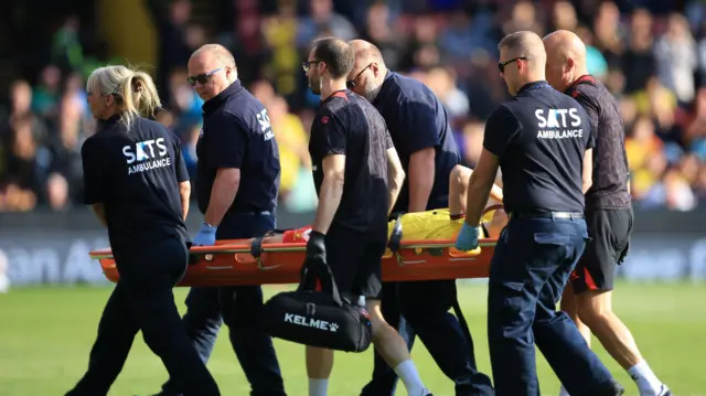 Giorgi Chakvetadze is stretchered off injured in the Watford v Coventry game