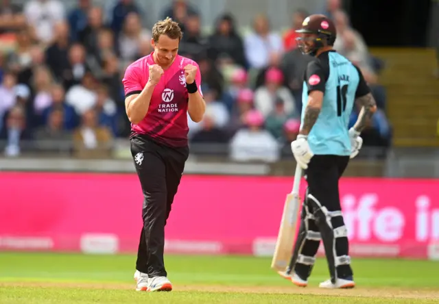 Josh Davey celebrates taking wicket