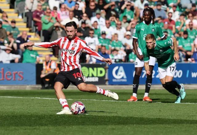 Patrick Roberts scoring a penalty