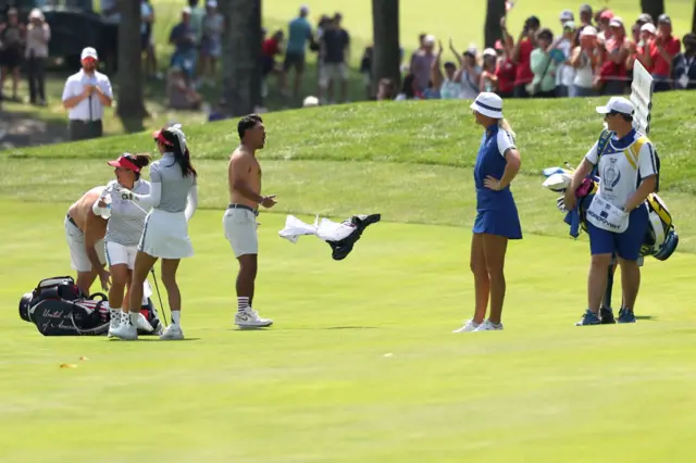 US caddies celebrate topless