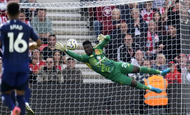 Andre Onana makes a diving save