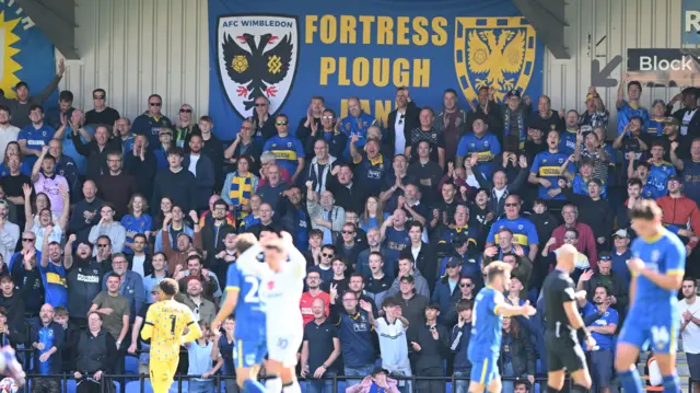 AFC Wimbledon take on MK Dons at Plough Lane