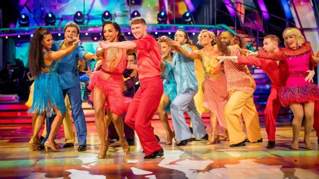 The 2024 Strictly Come Dancing Celebrities & Professional Dancers perform a group dancer on the ballroom  floor