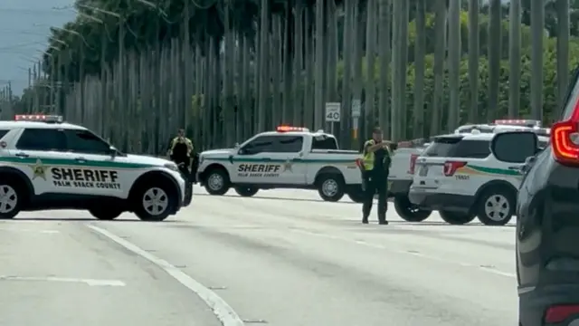 Police vehicles are seen at a scene following reports of multiple shots fired near the golf course of Republican presidential candidate Donald Trump, in West Palm Beach, Florida, U.S., September 15, 2024.