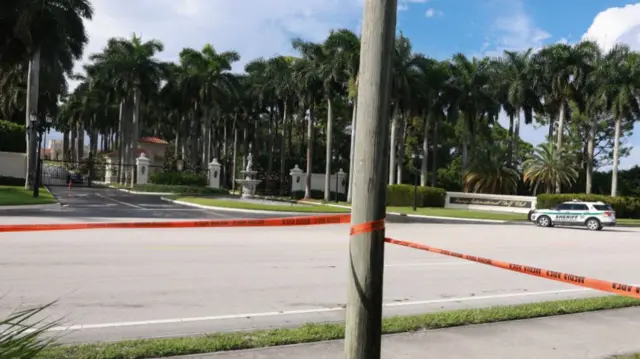 Law enforcement secures the area around Trump International Golf Club after an apparent assassination attempt of former President Donald Trump on September 15, 2024 in West Palm Beach, Florida