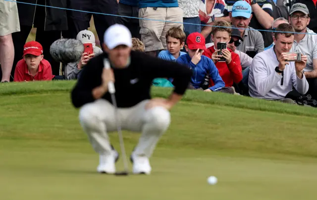 Fans watching Rory McIlroy on the 11th green