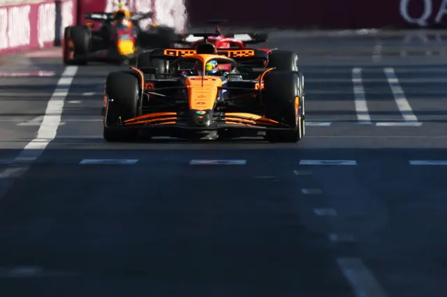 Oscar Piatri ahead of Charles Leclerc