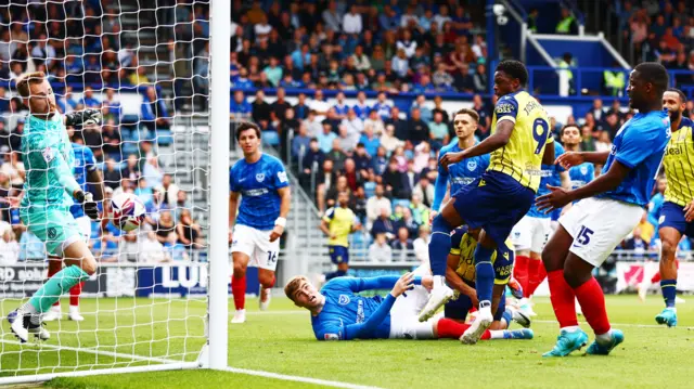 Josh Maja of West Bromwich Albion sees his header saved by Will Norris of Portsmouth.