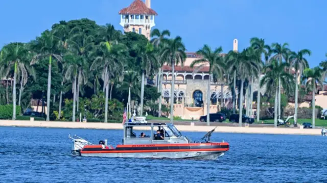 A U.S. Coast guard patrol boat operates around Mar-A-Lago