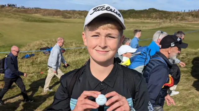 Jamie poses with Rory McIlroy's ball