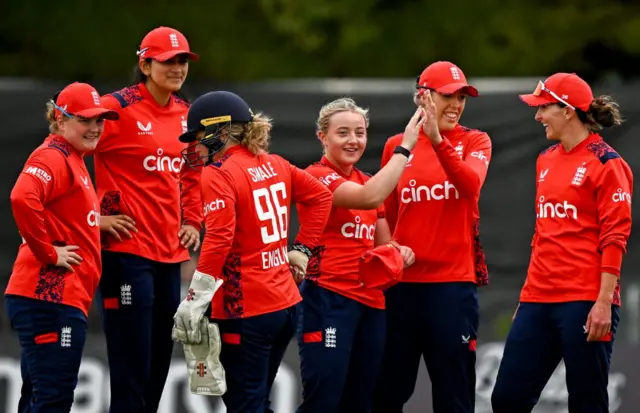 England celebrating a wicket