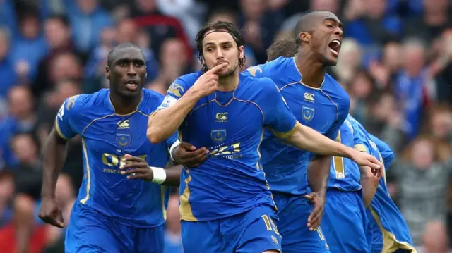 Portsmouth celebrate a goal against West Brom in 2009