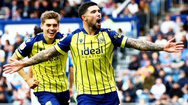 Alex Mowatt celebrates