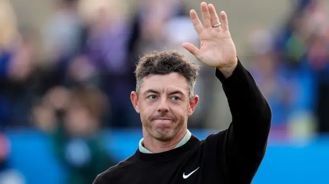 Rory McIlroy acknowledges the home fans after completing his round at Royal County Down on Sunday