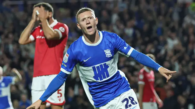 Jay Stansfield celebrates scoring against Wrexham.