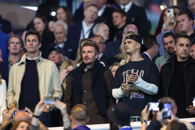 om Brady, minority owner of Birmingham City stood next to David Beckham and his son, Romeo Beckham, and Gary Neville