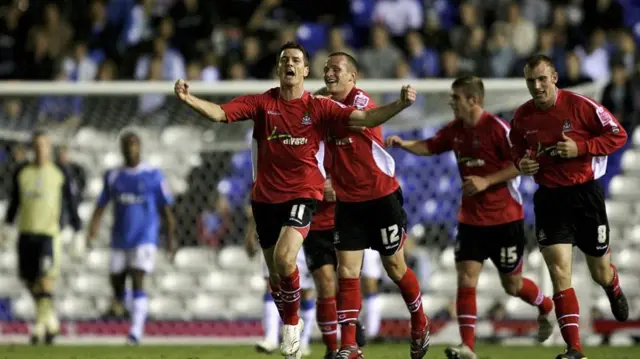 Wrexham's Chris Llewellyn celebrates after putting his side ahead at St Andrew's in September 2006