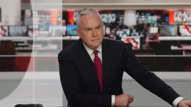 Huw Edwards presenting the BBC television news in 2022