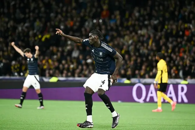 Amadou Onana celebrates