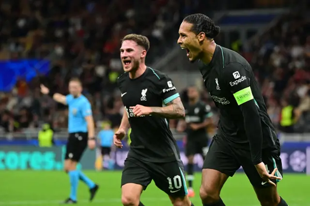 Virgil van Dijk (R) celebrates