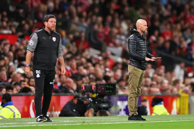 Both managers on the touchline