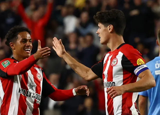 Brentford's Christian Norgaard celebrates scoring their third goal with Fabio Carvalho