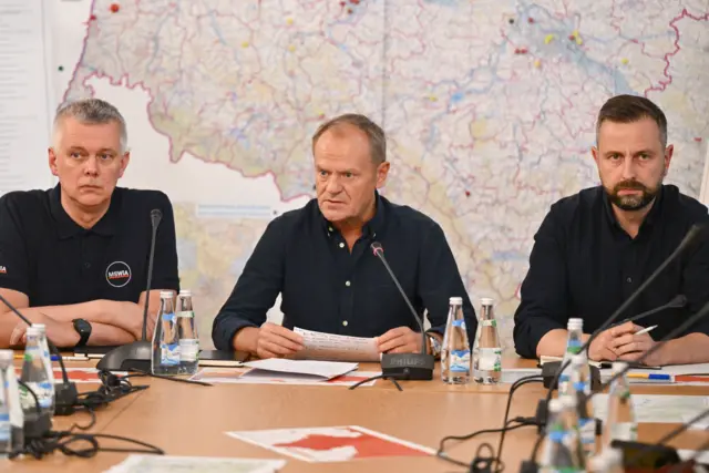 Donald Tusk (C) led the crisis meeting in Wroclaw, southwest Poland