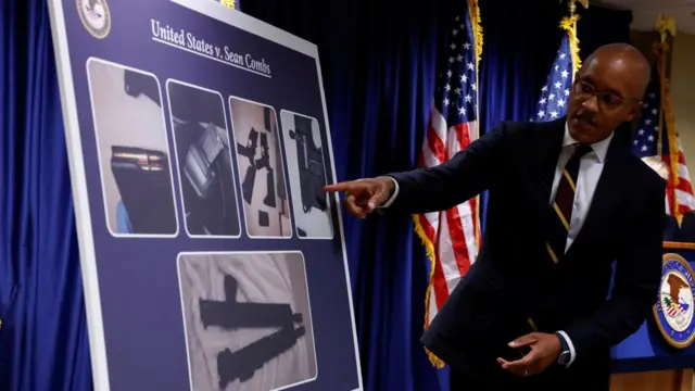 U.S. Attorney Damian Williams points at a chart, during a press conference to announce the unsealing of an indictment charging music mogul Sean "Diddy" Combs