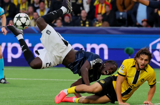 Aston Villa's Amadou Onana in action with BSC Young Boys' Jaouen Hadjam