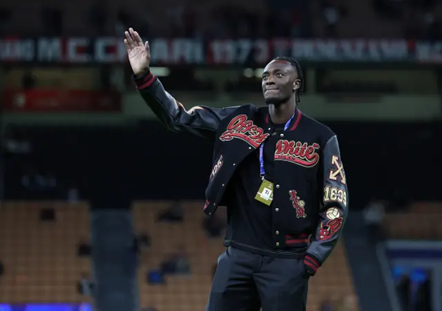 Tammy Abraham of AC Milan inspects the pitch