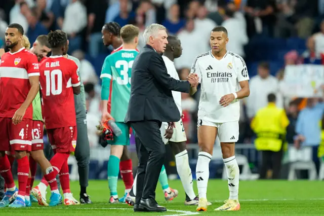 Carlo Ancelotti head coach of Real Madrid and Kylian Mbappe centre-forward of Real Madrid