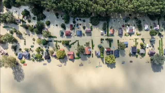 An aerial picture taken with a drone shows the flooded resort village of Venek in Hungary