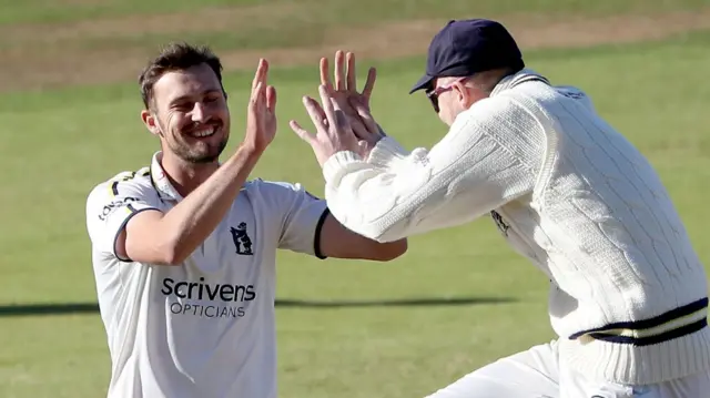 Ed Barnard takes a wicket