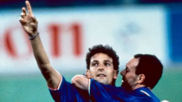 Roberto Baggio celebrates a goal with Schillaci