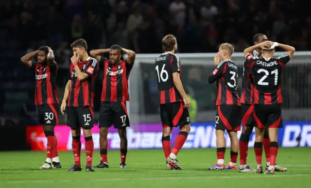 Fulham players looking frustrated