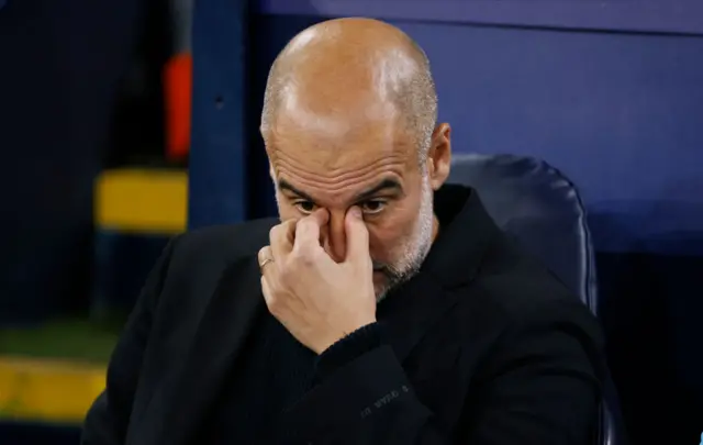 Guardiola pinches his nose