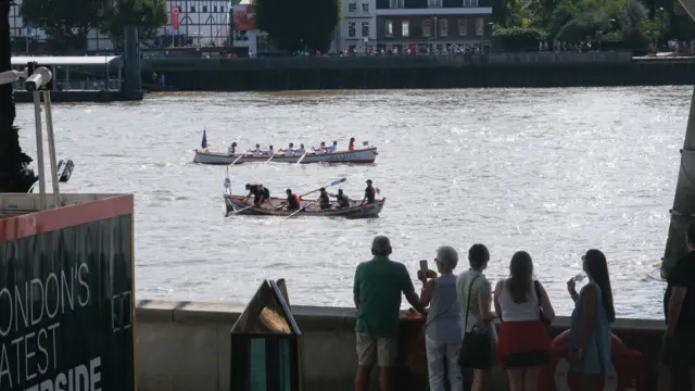 People watch last year’s race