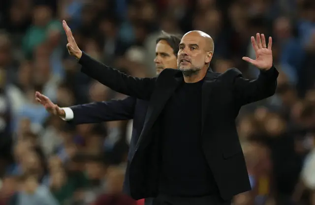 Pep waves his arms to ask for calm on the pitch