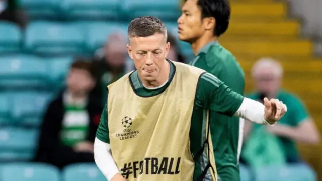 Celtic captain Callum McGregor warming up