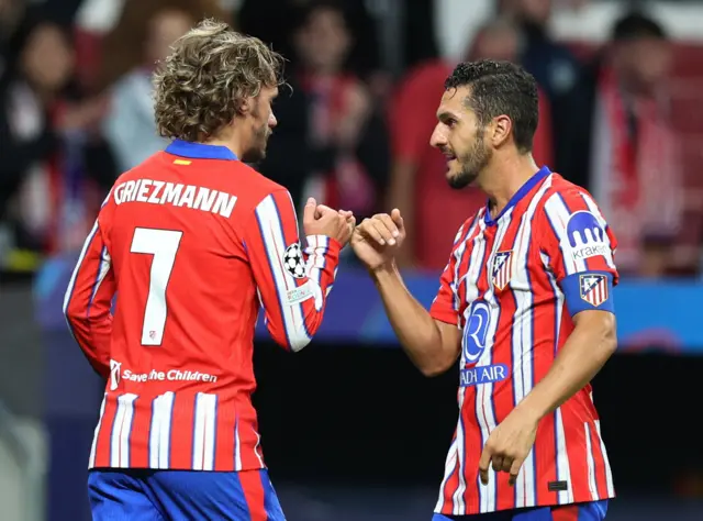 Antoine Griezmann celebrates with Koke